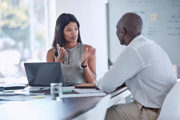 Businesswoman analyzing grant opportunities and deadlines for small business funding 2026